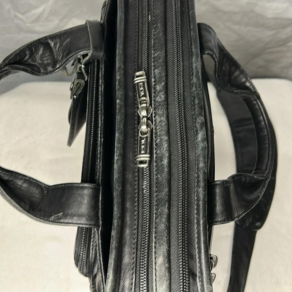 TUMI Rare black Alpha leather laptop briefcase messenger bag. Detach straps.